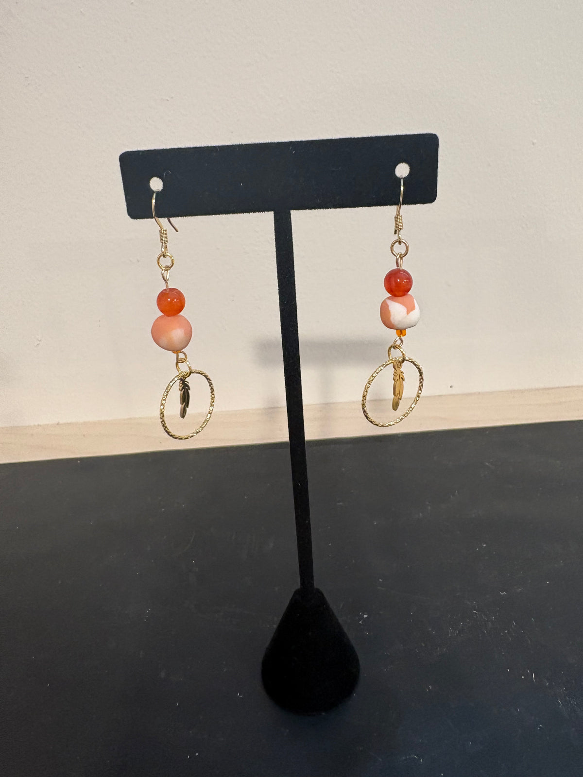 Clay beaded earrings w/feather